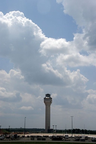 dullestower.jpg - This is the control tower at Dulles framed by  a glorious gaggle of clouds.